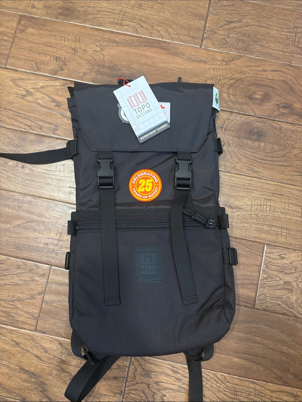 Topo Designs Black Roll-Top Backpack with 25th Anniversary Patch